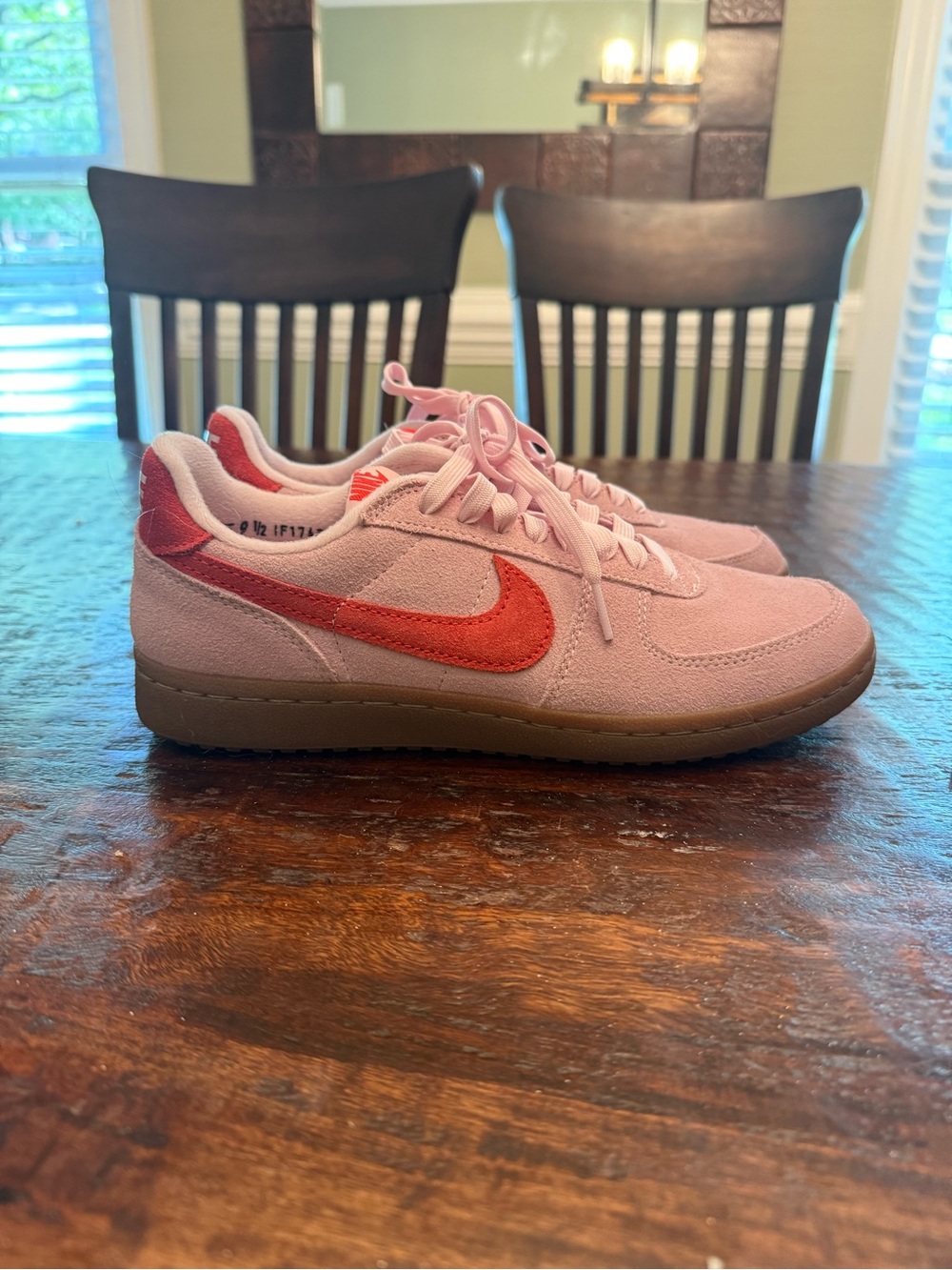 Nike Women's Pink Suede Sneakers with Red Swoosh